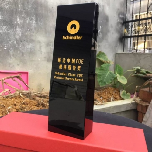 curved design black crystal customer service awards with golden logo