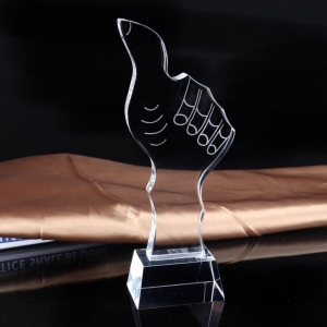 thumbs-up crystal hand trophy for best performance employee or player